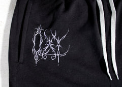 Black hoodie with white embroidered design on a white background