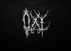 White embroidered logo on a black fabric background