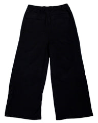 Black pants on a light gray textured background