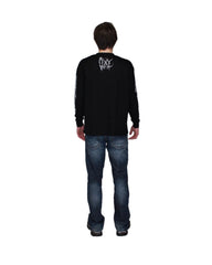 Person wearing a black long-sleeve shirt with a logo on the back against a white background